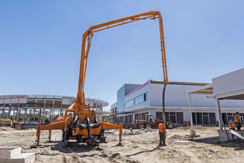 Boom concrete pump working on site in Brighton